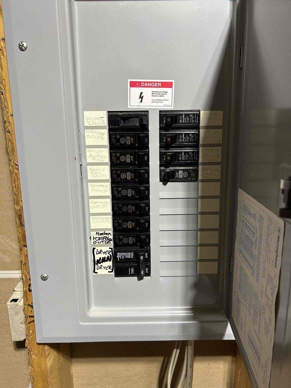 Conducted inspection of customer's existing 2004 furnace system to provide replacement quote as requested. System is currently operational but at end of recommended service life. Documented current setup including digital programmable thermostat showing 65°F setting and electrical panel configuration for proper sizing of replacement unit.