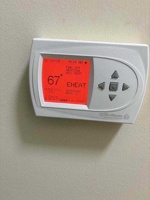 Performed heating maintenance on steam canister system. Inspected and verified proper thermostat operation (67° temperature, 45% humidity, EHEAT mode with auxiliary heat active). Checked and replaced dirty air filter to ensure optimal system performance. Also diagnosed and repaired running toilet in Master Bedroom per customer request.