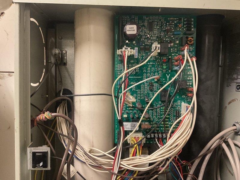 Diagnosed no heat complaint on unit less than 10 years old. Inspected electrical control board and found faulty connection at the flame sensor terminal. Cleaned burner assembly, restored proper flame detection, and verified normal ignition sequence with proper burner operation. Unit is now heating correctly with no issues.