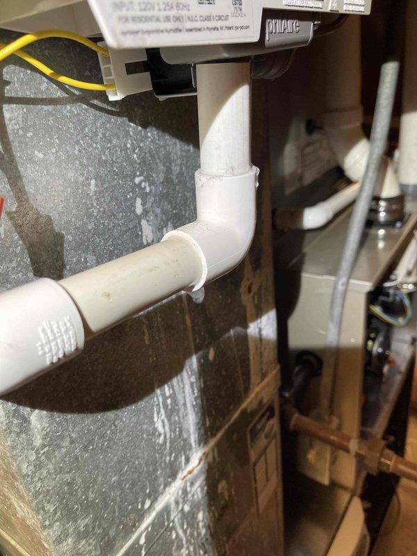 Responded to warranty call for water leakage from recent installation. Inspected electrical connections and drainage system of HVAC unit. Identified and corrected improper PVC drain line configuration that was causing condensate leakage.
