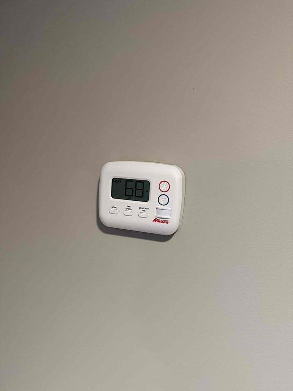 Successfully replaced three Amana heat pump PTAC units with outdoor sensors (model PTH153J50AX) in the 6th, 8th, and 9th floor lobby areas as specified. Units were properly installed, connected to power, and programmed to maintain desired temperature settings of 68 degrees as verified by digital thermostat display.