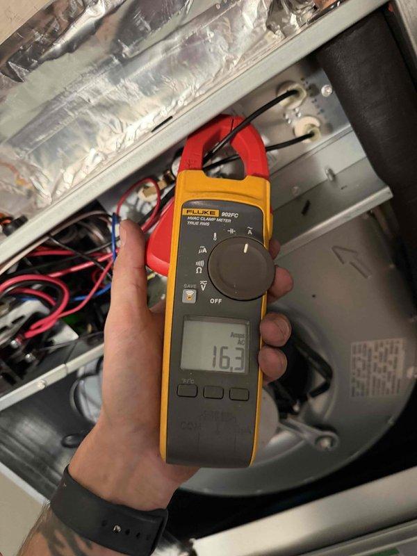 Successfully installed a complete HVAC system featuring a Carrier FMA5X2400AL wall hung air handler with 8 KW electric heat kit (TUTEHK208) and a 26SCA424N003 2-ton Carrier comfort series condenser. Flushed and reused existing copper line-set, connected to existing drain line, electrical connections and duct work, and properly disposed of the old equipment.