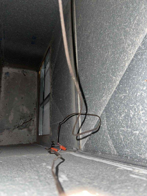 Responded to a water leak callback where investigation revealed moisture issues within the wall cavity. Inspected the PVC drain pipe system including cleanout access point and connecting segments. Found improper installation and water intrusion in the ventilation ducting with evidence of moisture damage to the insulation and surrounding structure.