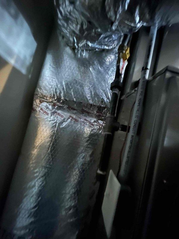 Conducted comprehensive evaluation for whole home humidifier installation. Inspected existing HVAC ductwork with metallic insulation and examined electrical service panel to determine power availability for the proposed humidifier system. Photos documented current installation conditions to ensure proper equipment selection and placement for optimal indoor air quality improvement.