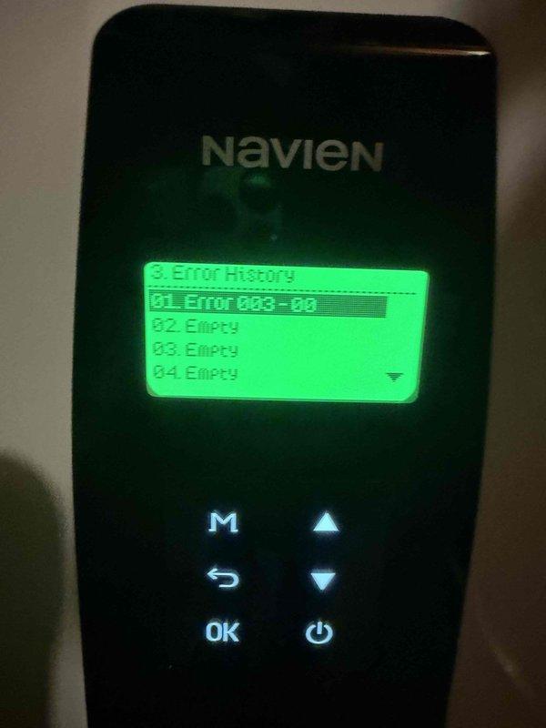 Responded to service call for Navien water heater displaying error code 033 (Emission Failure). Inspected system and accessed error history through control panel, which confirmed single error occurrence (003-08). Advised customer that while unit continues to provide hot water, the emission error requires monitoring and may indicate developing combustion issues.