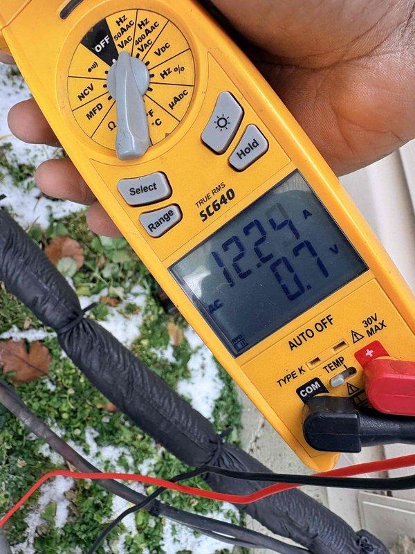 Conducted comprehensive tune-up service on customer's HVAC system. Performed electrical diagnostic testing, measuring voltage readings of 122.4V/0.7V with Fieldpiece SC640 multimeter and 58.8 on secondary diagnostic equipment. Inspected system connections and verified proper operation of components.
