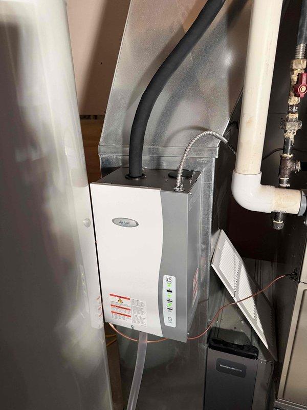 Successfully installed an Aprilaire steam humidifier to address indoor air quality concerns. System was integrated with the existing HVAC equipment, with proper connections to water supply, drainage, and electrical components. Unit was tested and verified operational with appropriate humidity output settings.