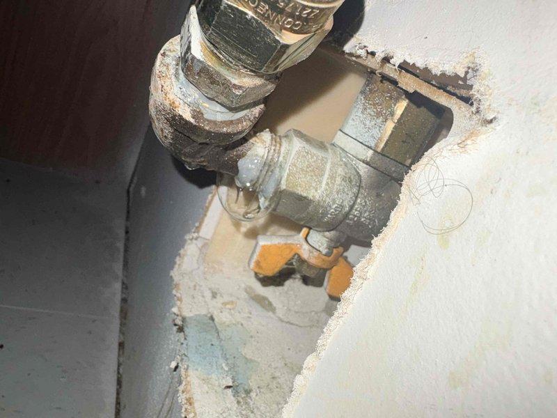 Responded to report of gas leak at Red Maple Grove Townhomes. Inspected plumbing connections showing significant corrosion, mineral buildup, and oxidation on metallic pipe fittings and valves. Confirmed Citizens is still detecting gas leak at the property.