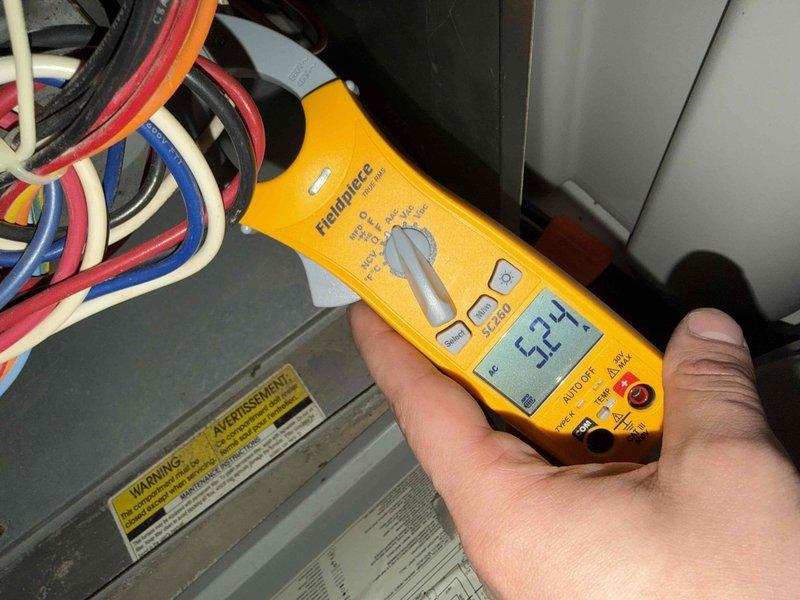 Arrived on site for no heat complaint. Performed electrical diagnostics using multimeter, confirming voltage readings of 52.4V at the system. Testing revealed faulty thermostat as suspected, which was affecting proper heating operation. Replaced thermostat, tested system operation, and verified proper heat function before departure.