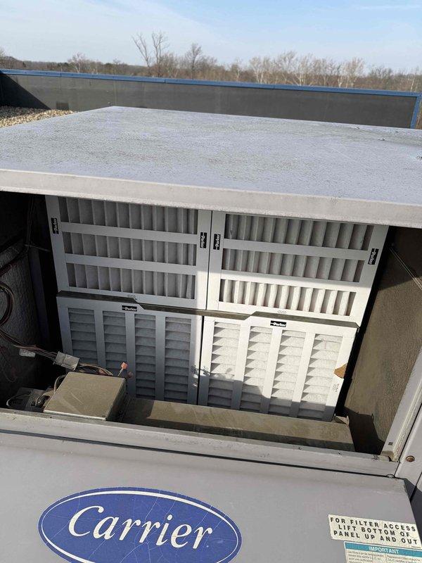 Completed winter filter change service on three commercial units: replaced four 16x24x2 filters in a Daikin unit, four 14x20x2 filters in a second Daikin unit, and four 16x16x2 filters in a Carrier unit. All systems are now operating with clean filters for optimal airflow and efficiency.