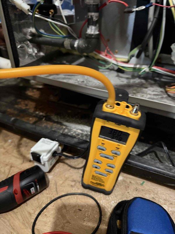 Diagnosed no heat issue in commercial unit; found faulty pressure switch preventing proper ignition. Replaced pressure switch, verified proper operation with digital manometer showing appropriate readings. Completed scheduled maintenance service including cleaning and inspection of all components, restoring normal heating function.