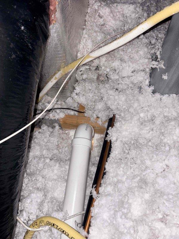 Inspected customer's concern about improper furnace venting and potential exhaust recirculation into the home. Conducted a thorough examination of the venting system in the attic where exposed insulation surrounds PVC vent piping. Verified condition of all visible vent connections and confirmed proper installation with no evidence of exhaust leakage into living space.