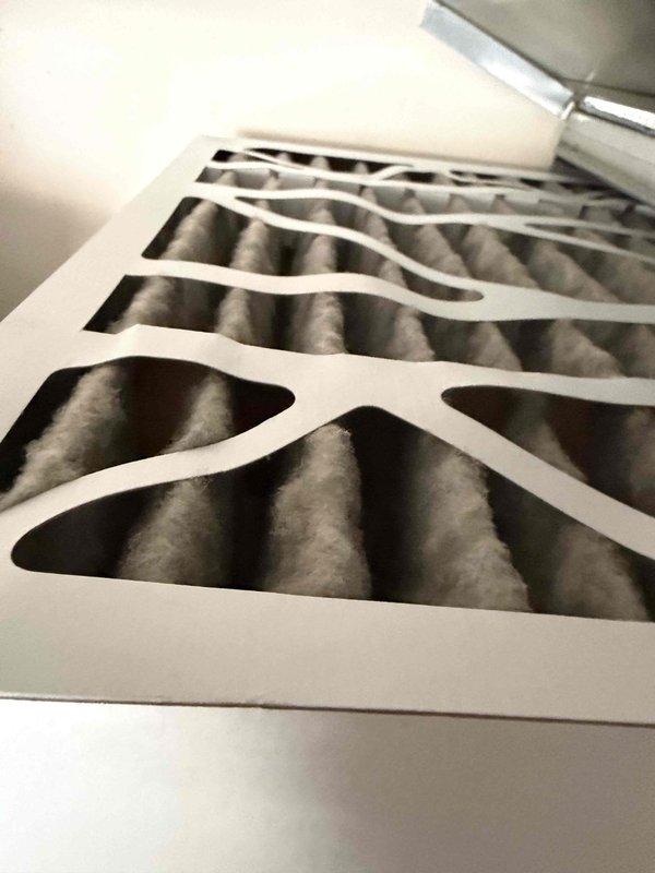 Completed scheduled heating maintenance service on the system. Confirmed heat output temperature reading of 136.0°F using digital thermometer and inspected air filter, which showed normal dust accumulation but remains functional. All components operating within specifications.