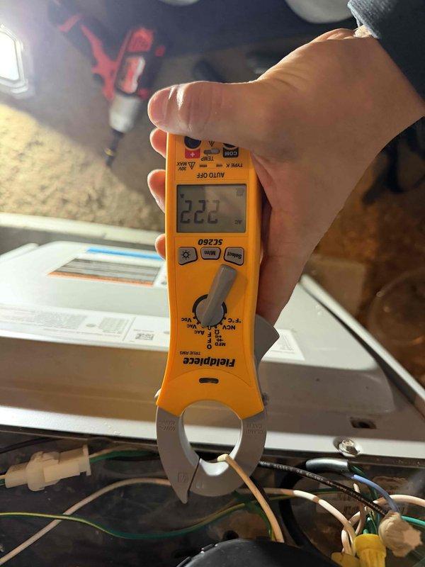 Responded to no heat complaint in heat pump system. Inspected and changed dirty air filter which was restricting airflow. Verified proper voltage supply (222V) to unit using Fieldpiece clamp meter. System now operating with improved heat output.