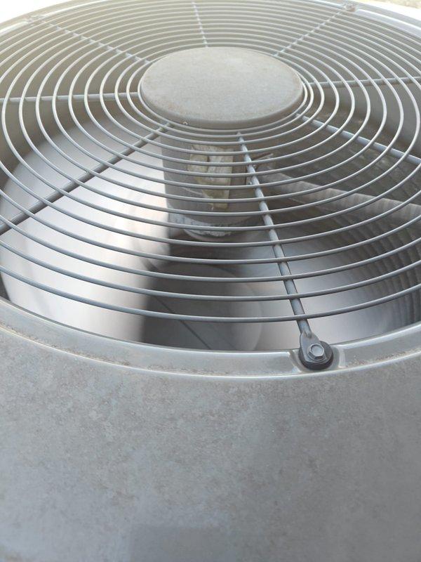 Performed regular maintenance inspection on cooling system, testing electrical components with clamp meter showing normal amperage readings (0.5 amps). Visually inspected outdoor condenser unit including fan assembly and protective grille, which showed normal wear with no significant issues. Customer renewed maintenance plan for upcoming cooling and heating seasons.