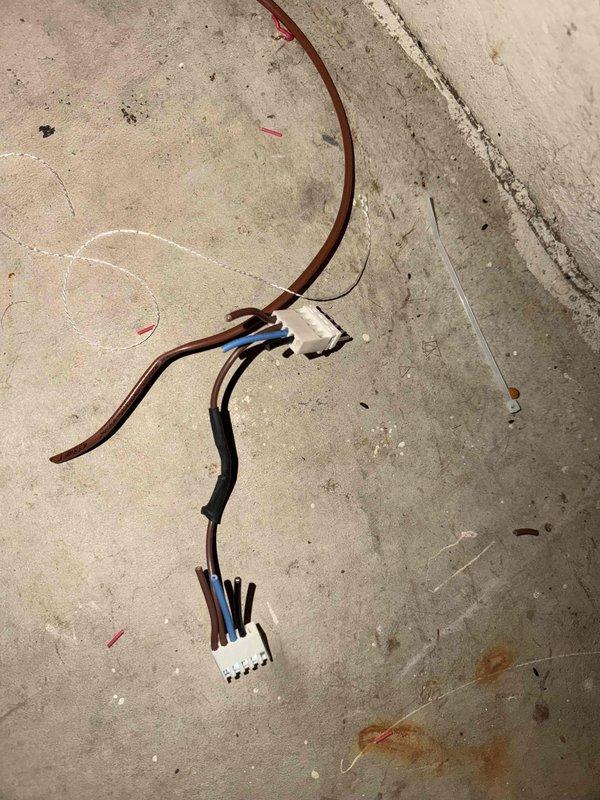 Completed quoted electrical repairs involving replacement of damaged wiring. Removed faulty wire sections exhibiting frayed copper conductors and insulation damage, then installed new properly terminated connections at terminal block to restore system functionality.