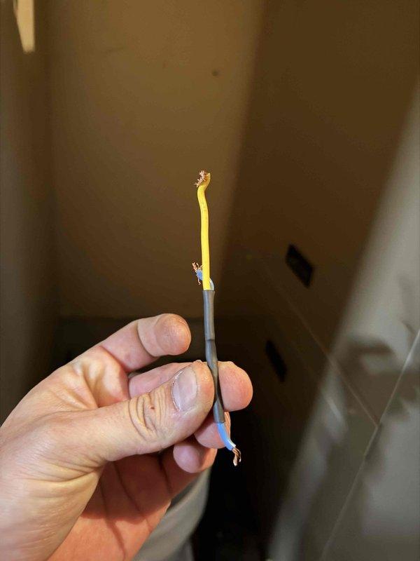 Completed quoted electrical repairs involving replacement of damaged wiring. Removed faulty wire sections exhibiting frayed copper conductors and insulation damage, then installed new properly terminated connections at terminal block to restore system functionality.