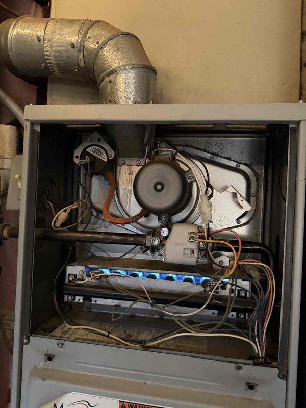 Responded to no-heat call at rental property owned by Joe Zupan. Diagnostic inspection revealed significant dust accumulation on blower wheel fins causing restricted airflow. Cleaned blower assembly and verified proper operation of ignition system. Unit is now functioning correctly with normal heat output.