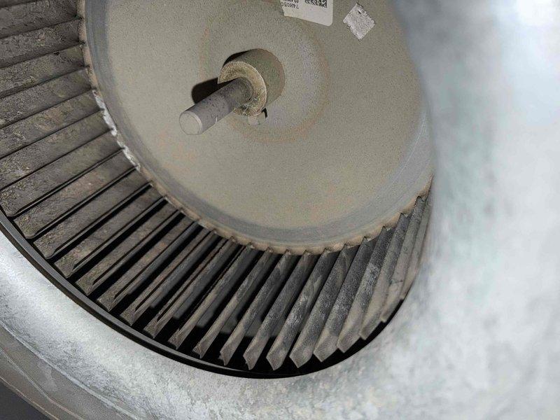 Performed heating maintenance on system, including inspection of blower wheel which showed dust accumulation requiring cleaning. Conducted electrical diagnostics with readings of 33 amps on control circuitry, confirming system is operating within normal parameters.