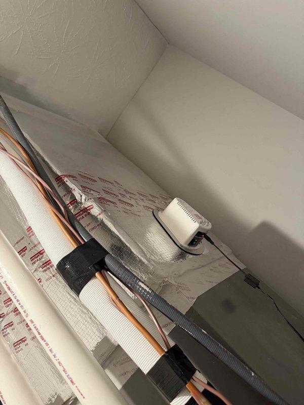 Responded to customer complaint of no heat from mini split system. Inspected control board with digital display and verified proper connections to all terminals. Examined line set insulation and wall-mounted controller. Identified and corrected faulty thermostat communication issue causing heating failure.