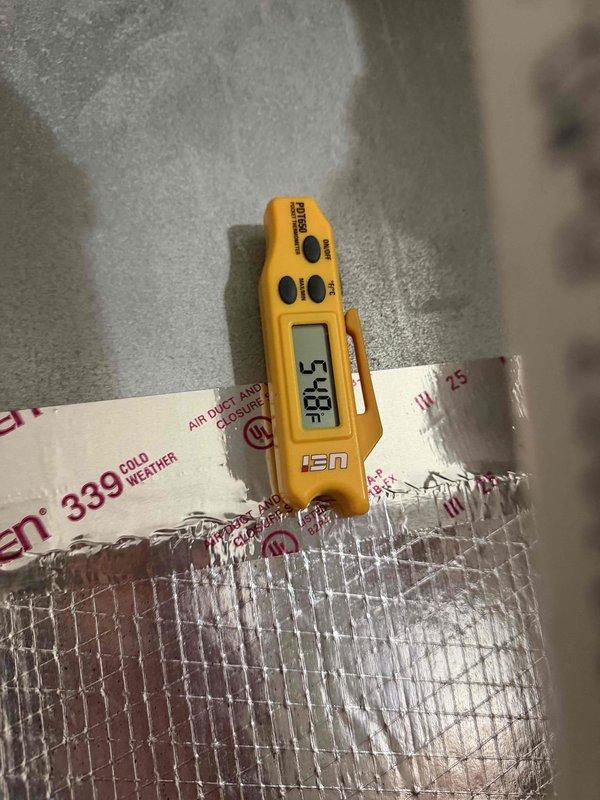 Responded to third call back for inoperative heating system. Diagnosed temperature issue with supply air (80.5°F measured at insulated ductwork). Inspected both outdoor units, verified proper operation of newer model and confirmed electrical connections at disconnect boxes were secure. System now functioning within normal parameters.