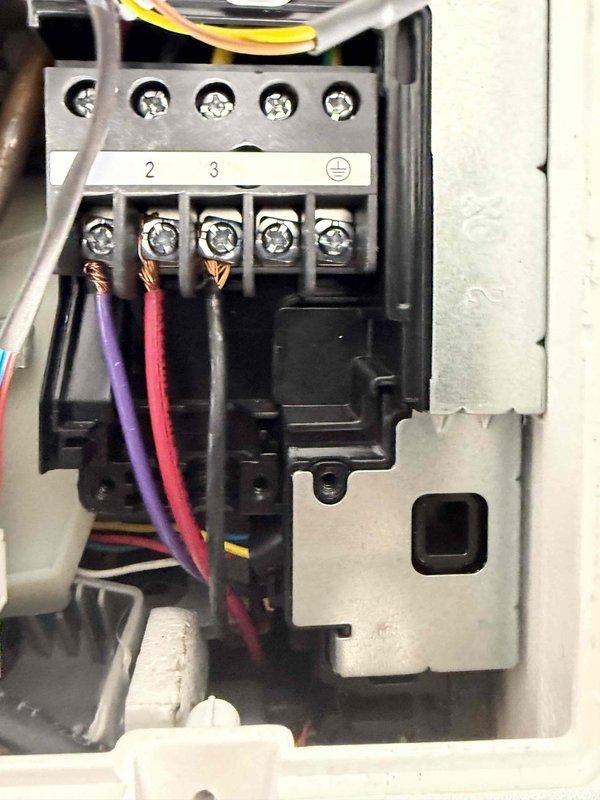 Completed installation of a Durastar 18K multizone ductless heat pump system with two 9K high wall mount cassettes. Existing copper line sets were flushed and reused. Performed electrical connections to terminal block with proper wire routing and secured all components for optimal system operation.