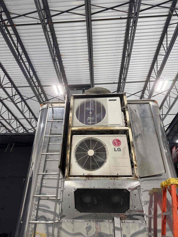 Completed installation of a Durastar 18K multizone ductless heat pump system with two 9K high wall mount cassettes. Existing copper line sets were flushed and reused. Performed electrical connections to terminal block with proper wire routing and secured all components for optimal system operation.