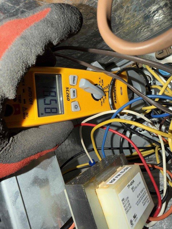 Performed annual heating maintenance service on system. Conducted temperature differential testing with readings of 36°F and verified electrical components using Fieldpiece G6D25 multimeter with 45.6V reading across control board connections. All components functioning within manufacturer specifications.