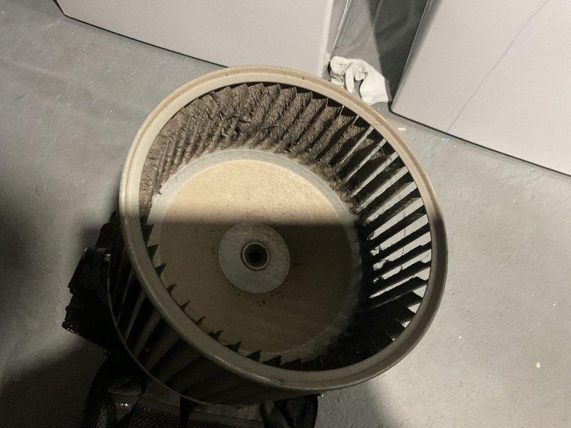 Performed tune-up service and discovered severely clogged blower wheel. Removed blower assembly for thorough cleaning, removing significant dust and debris accumulation from between the fan blades that was restricting proper airflow. Reassembled and tested system to ensure restored efficiency and proper operation.