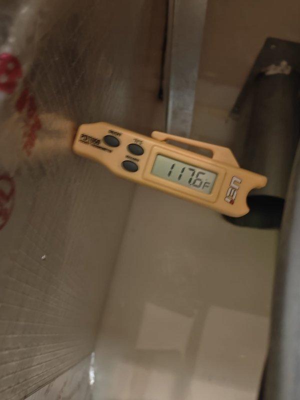 Performed scheduled heating maintenance service on system. Conducted temperature testing with readings of 117.5°F and measured static pressure at +343.1 in-WG using UEI EM201B digital manometer. System is operational with all measurements within acceptable parameters.