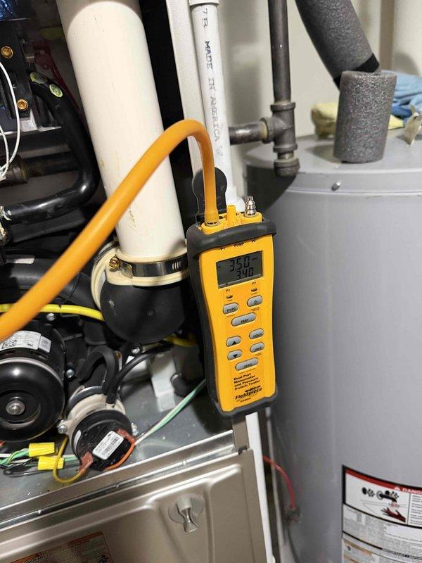 Performed annual heating maintenance service including inspection and replacement of air filter. System diagnostics were conducted with Fieldpiece analyzer showing readings of 350/200, verifying proper operation of the heating system. All components were found to be in good working condition with no issues identified.