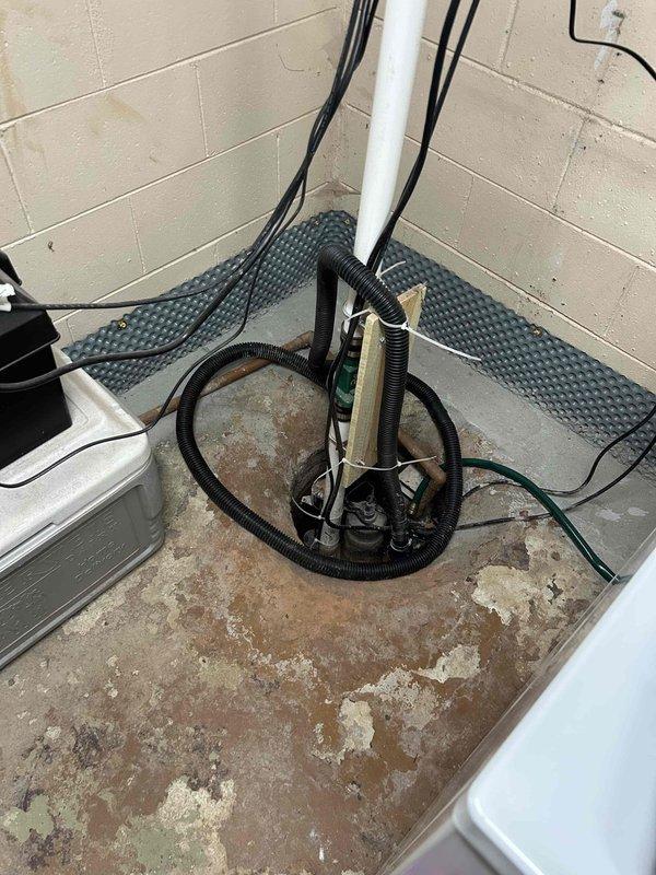 Conducted comprehensive inspection of aging Honeywell WeatherMaker furnace system for potential replacement. Evaluated existing ductwork connections, electrical components, and drainage system in utility room. Prepared separate quotations for furnace-only replacement option and complete HVAC system replacement including both furnace and air conditioning units as requested by customer.