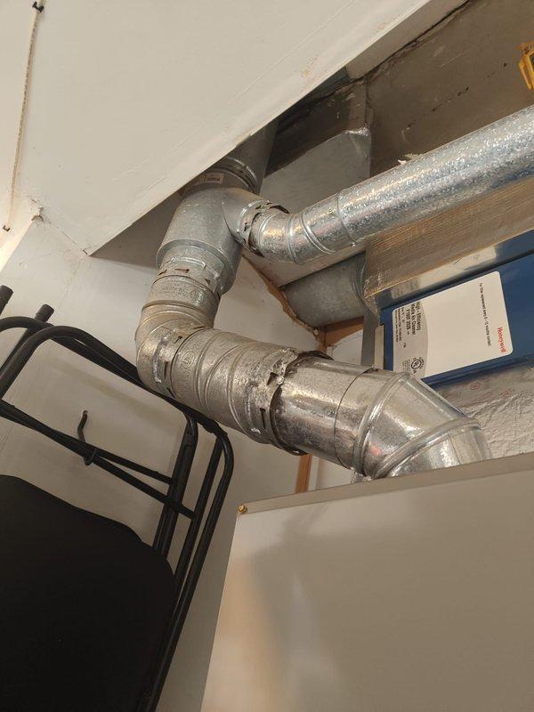 Performed annual heating system maintenance on a residential unit. Inspected ductwork and ventilation piping for proper installation and connections. Cleaned accumulated dust and debris from blower wheel assembly to improve system efficiency and airflow.