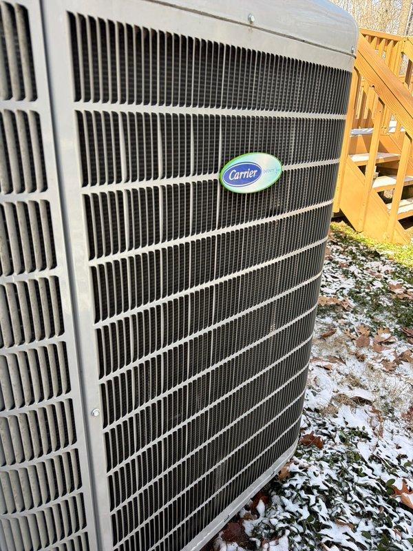 Performed annual heating maintenance on Carrier system. Conducted electrical diagnostics using Fluke 902FC clamp meter, measuring 18.3 amp draw on primary components. Inspected outdoor unit condition with special attention to condenser coils and housing integrity despite cold weather conditions.