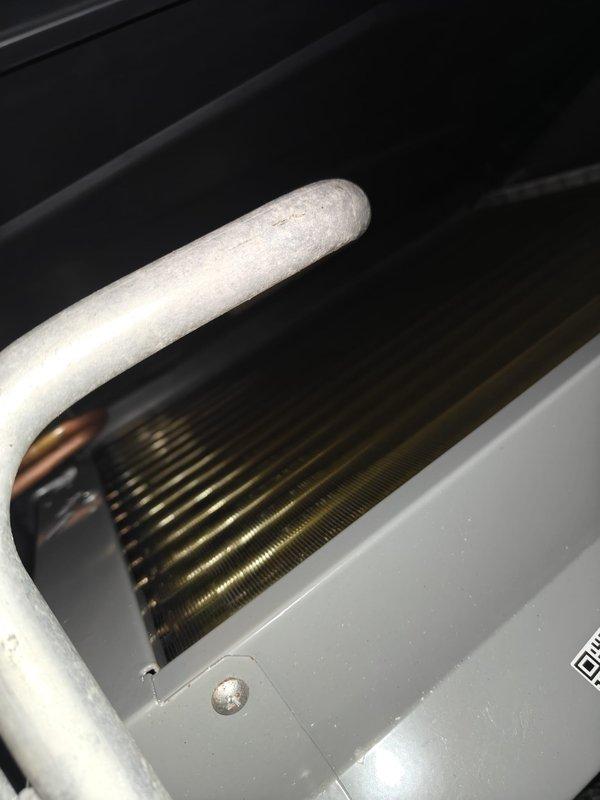 Completed heating maintenance on system. Inspected condenser coil and insulated refrigerant line for proper condition. Performed temperature differential testing with digital meter, recording a reading of 7.46, which falls within acceptable parameters for proper system operation.