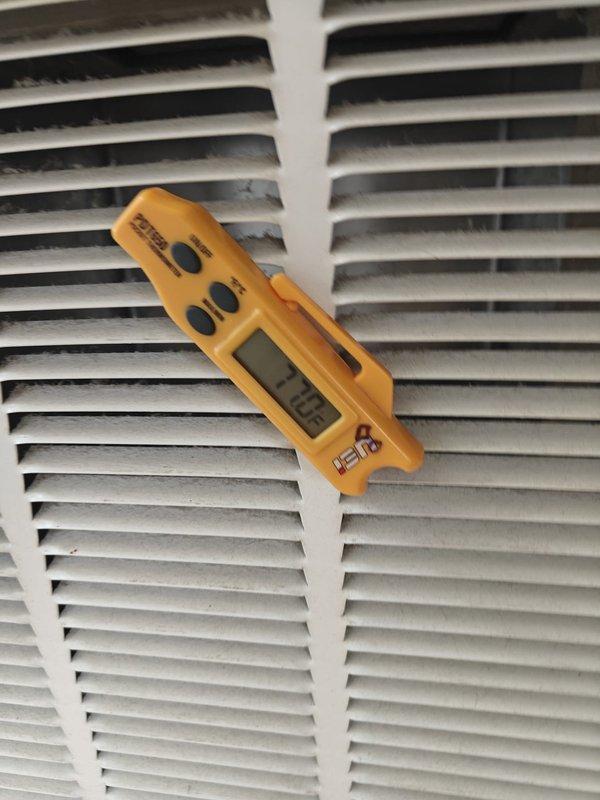 Completed heating maintenance on system. Inspected condenser coil and insulated refrigerant line for proper condition. Performed temperature differential testing with digital meter, recording a reading of 7.46, which falls within acceptable parameters for proper system operation.