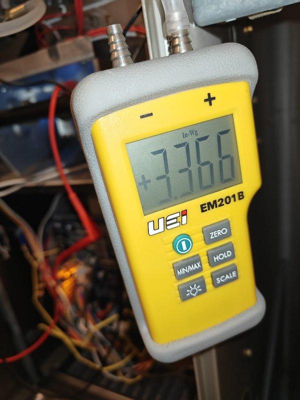 Performed routine heating system maintenance service, including differential pressure testing with UEI EM201B meter (reading +3366 In-Wg) and inspection of the control board with heat off-delay function. All connections were verified and system operation confirmed to manufacturer specifications.