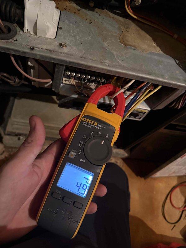 Diagnosed customer's furnace that was not maintaining adequate temperature. Performed electrical diagnostics using Fluke clamp meter, recording amperage readings of 4.9A and power factor of 8.7 PF to identify system performance issues. Customer is acquainted with Steve.