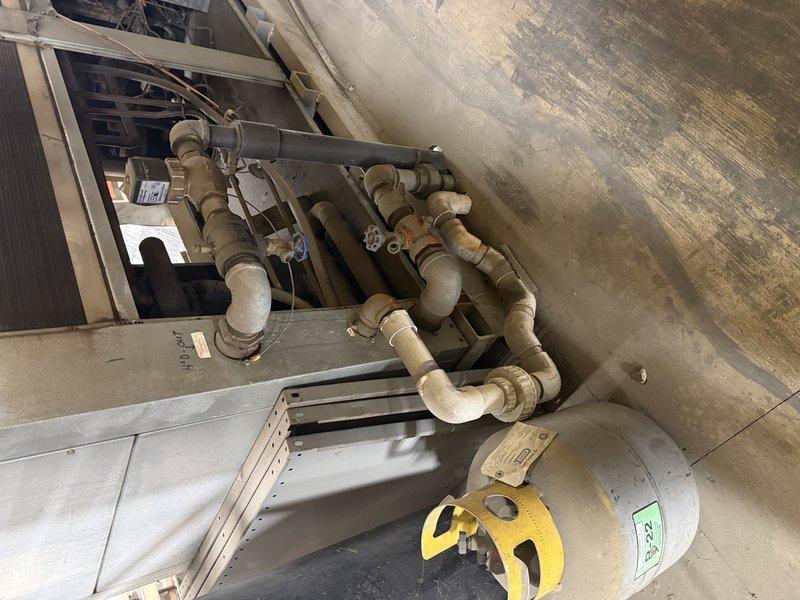 Conducted site assessment with Ronson to evaluate heating solutions for unheated shop areas. Inspected existing mechanical infrastructure including PVC piping network, pressure vessel, and ventilation equipment. Documented current HVAC components and available materials (insulation rolls) to develop appropriate heating system recommendations for the commercial space.