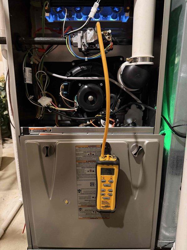 Performed comprehensive heating maintenance on dual system installation. Conducted diagnostic testing on primary furnace with Fieldpiece meter showing 149V reading, inspected electrical connections and gas valve assembly. Secondary system in utility area with PVC venting was also examined and serviced according to manufacturer specifications.