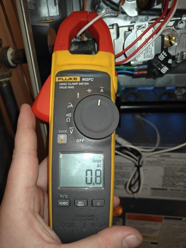 Performed scheduled tune-up service on customer's HVAC system. Conducted amperage testing of electrical components using Fluke 902FC clamp meter (measured 0.8 Amps AC). Inspected exhaust ventilation system and verified proper installation of all connecting pipes and hoses.