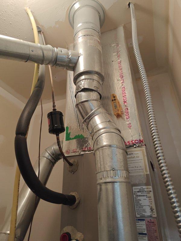 Performed scheduled tune-up service on customer's HVAC system. Conducted amperage testing of electrical components using Fluke 902FC clamp meter (measured 0.8 Amps AC). Inspected exhaust ventilation system and verified proper installation of all connecting pipes and hoses.