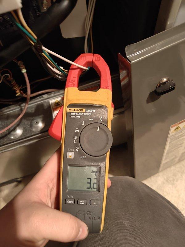 Performed annual heating system maintenance including comprehensive electrical diagnostics. Verified system amperage readings of 3.2A and 2.1A using Fluke 902FC clamp meter, confirming all values within manufacturer specifications. Equipment operating correctly with no issues detected.