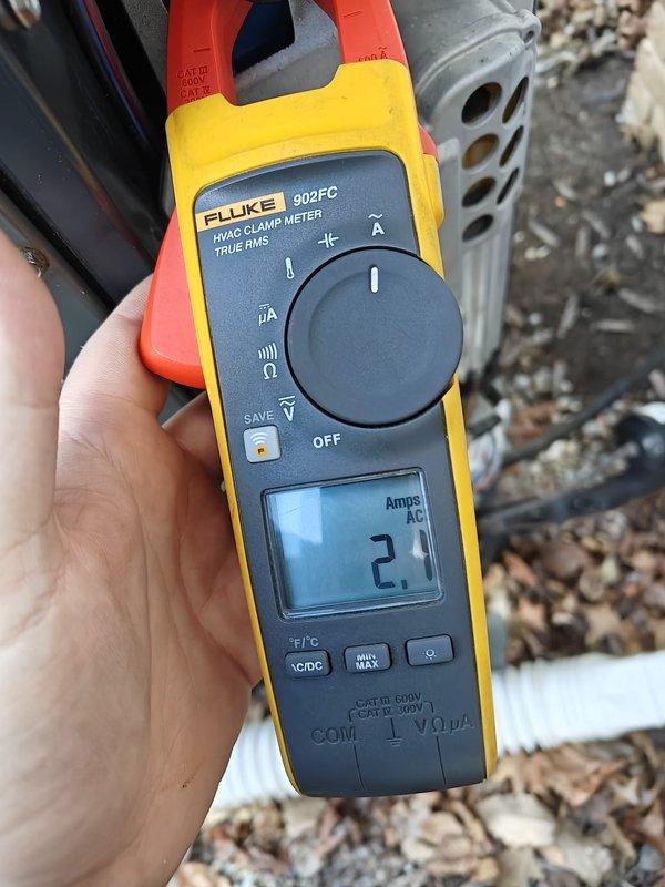 Performed annual heating system maintenance including comprehensive electrical diagnostics. Verified system amperage readings of 3.2A and 2.1A using Fluke 902FC clamp meter, confirming all values within manufacturer specifications. Equipment operating correctly with no issues detected.
