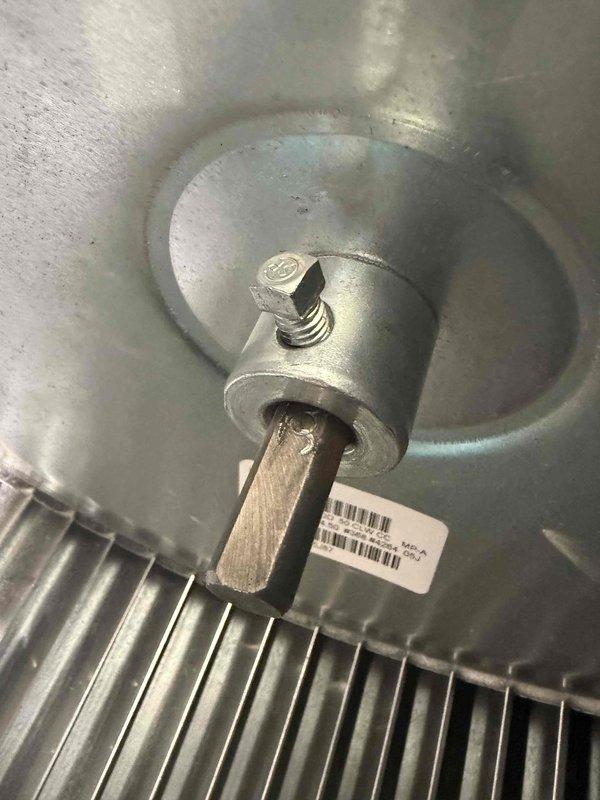 Responded to warranty service call regarding customer-reported blower rattling noise. Inspected HVAC unit, focusing on the blower assembly with fan blades and mounting components. Identified and secured loose hexagonal bolt in the metal mounting collar, eliminating the rattling sound during operation.