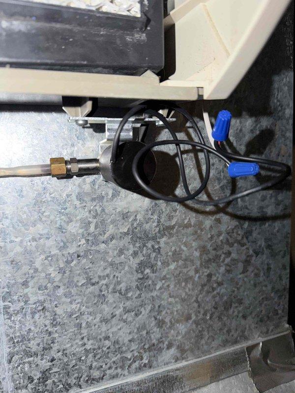 Completed IAQ service repairing electrical connection issue. Replaced faulty brass connector and rewired the component using appropriate tools. Equipment now functioning properly with all connections secured.