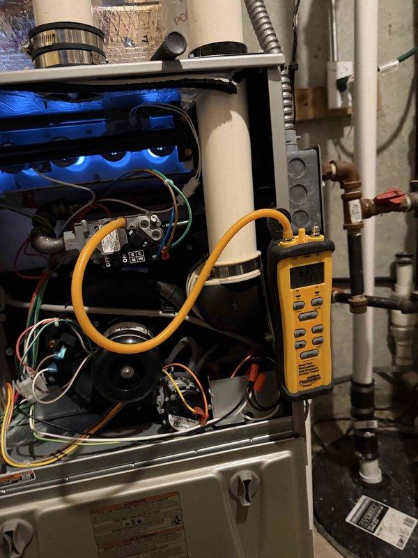 Performed heating maintenance service on residential system. Inspected control board and wiring connections for proper functionality. Tested burner operation with diagnostic equipment, confirming proper flame pattern and combustion.