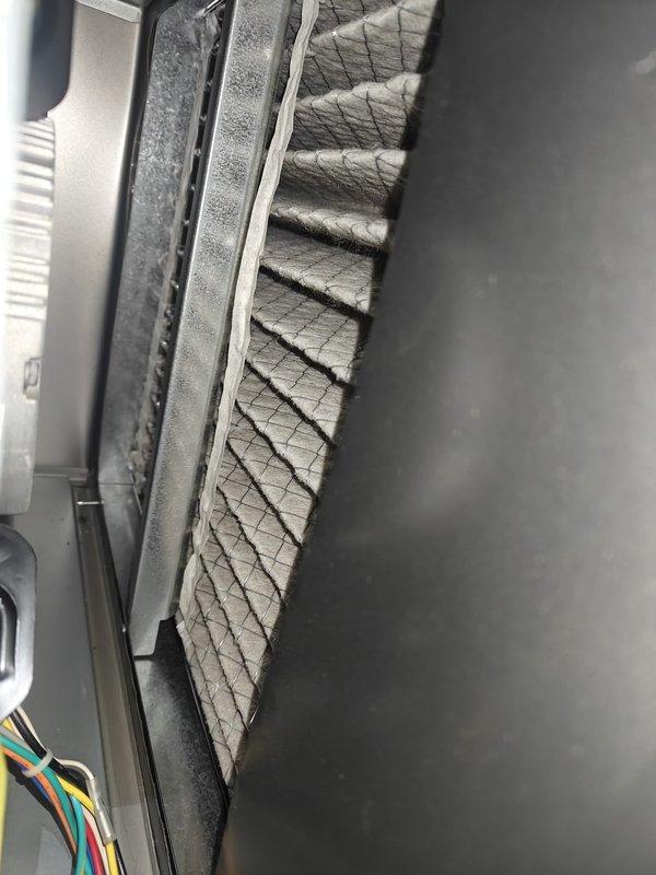 Performed heating system maintenance including inspection of air filter, which showed significant dust accumulation requiring replacement. Conducted electrical diagnostics with clamp meter showing 29 Amps current draw, verifying system is operating within normal parameters.