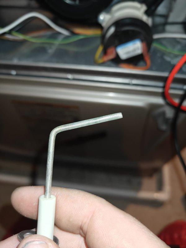 Performed heating tune-up on two systems. Inspected refrigerant lines with temperature probe showing 18.5°F reading. Customer declined filter replacement and was informed about credit card processing fee.