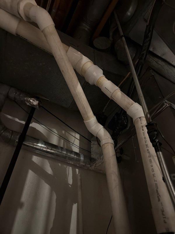 Performed annual heating maintenance on multiple HVAC systems including basement unit, upstairs unit, master suite system, and boiler. Investigated radiant heating issue in master bedroom where temperature would not exceed 63°F despite thermostat setting of 80°F. Conducted electrical testing using Fluke 902FC clamp meter and inspected plumbing infrastructure supporting the radiant heating system.